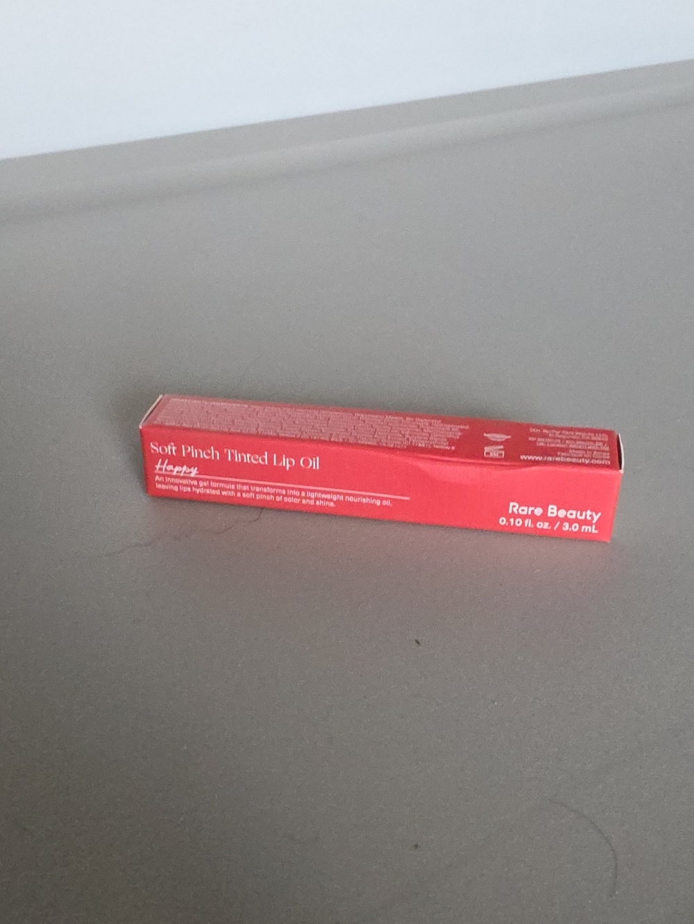 Rare BEAUTY lip Oil - HAPPY